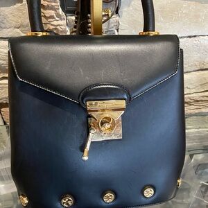 Salvatore Ferragamo Black Purse with Elegant Gold Trimmed Hardware